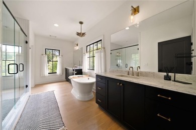 Stunning newer construction with modern flair, ideally located on Bobby Jones Golf Club in Georgia - for sale on GolfHomes.com, golf home, golf lot