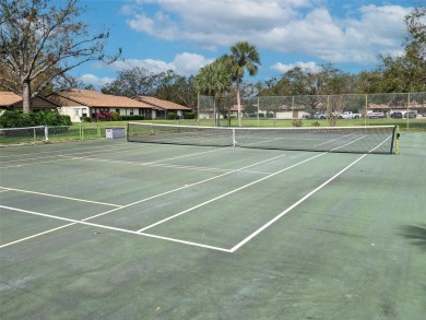 Welcome to Village Oaks, a charming and well-maintained on Bobby Jones Golf Club in Florida - for sale on GolfHomes.com, golf home, golf lot