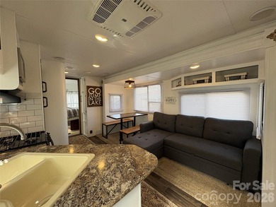 Welcome to easy lake living inside the gated community of Badin on Old North State Club at Uwharrie Point Golf community in North Carolina - for sale on GolfHomes.com, golf home, golf lot