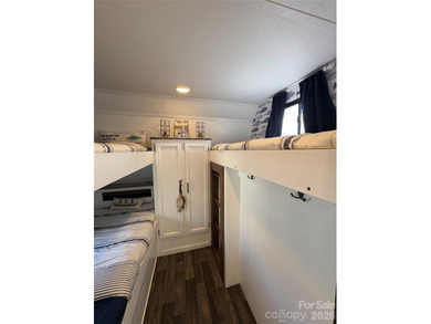 Welcome to easy lake living inside the gated community of Badin on Old North State Club at Uwharrie Point Golf community in North Carolina - for sale on GolfHomes.com, golf home, golf lot