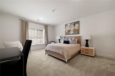 Stunning newer construction with modern flair, ideally located on Bobby Jones Golf Club in Georgia - for sale on GolfHomes.com, golf home, golf lot