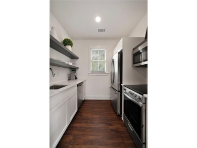 Stunning newer construction with modern flair, ideally located on Bobby Jones Golf Club in Georgia - for sale on GolfHomes.com, golf home, golf lot