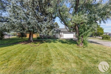 Located on the Lake Hills Golf course, this 4 bedroom, 3 on Lake Hills Golf Course in Montana - for sale on GolfHomes.com, golf home, golf lot
