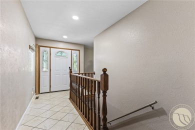 Located on the Lake Hills Golf course, this 4 bedroom, 3 on Lake Hills Golf Course in Montana - for sale on GolfHomes.com, golf home, golf lot