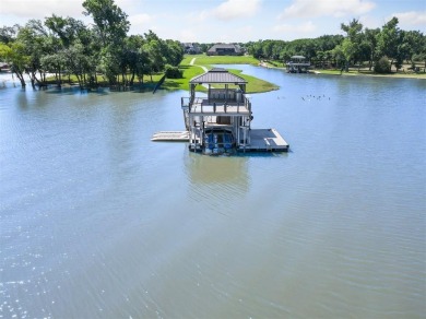 Lakefront Luxury Retreat on Eagle Mountain Lake. Experience the on The Golf Club at Resort Eagle Mountain Lake in Texas - for sale on GolfHomes.com, golf home, golf lot