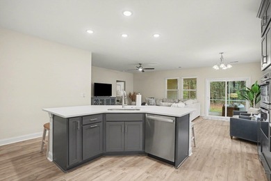 Tucked away on a private lot in the desirable Glasgow Village on International Club of Myrtle Beach in South Carolina - for sale on GolfHomes.com, golf home, golf lot