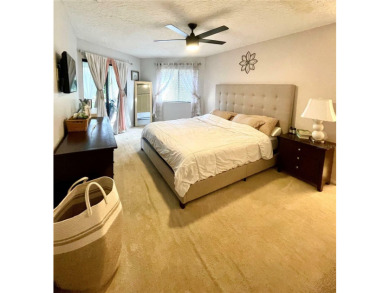 This upper-floor 2 bedroom, 2 bath condominium offers comfort on Palm Harbor Golf Club in Florida - for sale on GolfHomes.com, golf home, golf lot