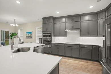 Tucked away on a private lot in the desirable Glasgow Village on International Club of Myrtle Beach in South Carolina - for sale on GolfHomes.com, golf home, golf lot