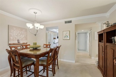 Discover refined living in this beautifully updated 2-bedroom on Cove Cay Country Club in Florida - for sale on GolfHomes.com, golf home, golf lot