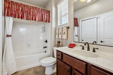 This delightful 2-bedroom home with a study and 2.5 baths is on Wildhorse Golf Club of Robson Ranch in Texas - for sale on GolfHomes.com, golf home, golf lot