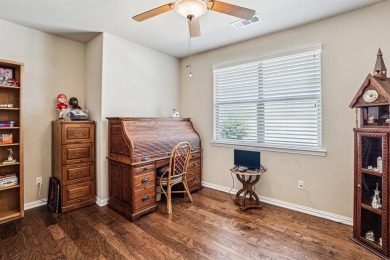 This delightful 2-bedroom home with a study and 2.5 baths is on Wildhorse Golf Club of Robson Ranch in Texas - for sale on GolfHomes.com, golf home, golf lot