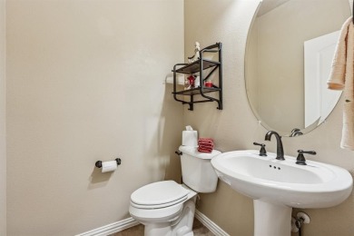 This delightful 2-bedroom home with a study and 2.5 baths is on Wildhorse Golf Club of Robson Ranch in Texas - for sale on GolfHomes.com, golf home, golf lot