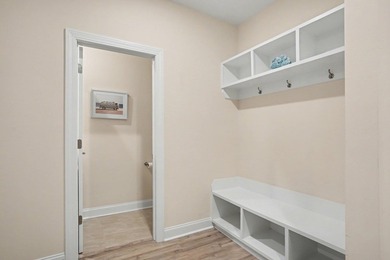 Tucked away on a private lot in the desirable Glasgow Village on International Club of Myrtle Beach in South Carolina - for sale on GolfHomes.com, golf home, golf lot