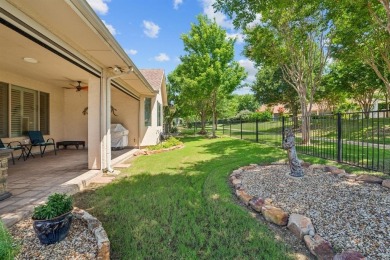 This delightful 2-bedroom home with a study and 2.5 baths is on Wildhorse Golf Club of Robson Ranch in Texas - for sale on GolfHomes.com, golf home, golf lot