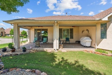 This delightful 2-bedroom home with a study and 2.5 baths is on Wildhorse Golf Club of Robson Ranch in Texas - for sale on GolfHomes.com, golf home, golf lot