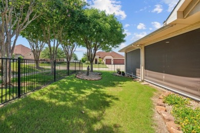 This delightful 2-bedroom home with a study and 2.5 baths is on Wildhorse Golf Club of Robson Ranch in Texas - for sale on GolfHomes.com, golf home, golf lot