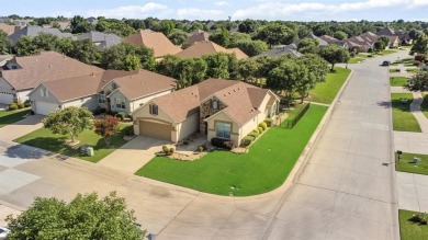 This delightful 2-bedroom home with a study and 2.5 baths is on Wildhorse Golf Club of Robson Ranch in Texas - for sale on GolfHomes.com, golf home, golf lot