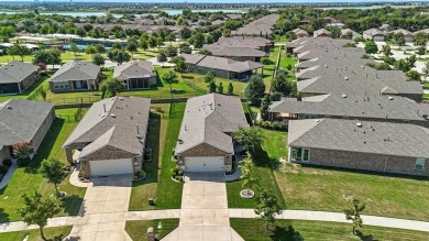 This sought after Steel Creek Model located in Frisco Lakes 55+ on Frisco Lakes Golf Course in Texas - for sale on GolfHomes.com, golf home, golf lot