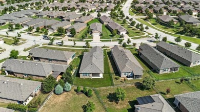 This sought after Steel Creek Model located in Frisco Lakes 55+ on Frisco Lakes Golf Course in Texas - for sale on GolfHomes.com, golf home, golf lot