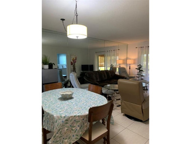 this is a beautiful  2 /1 condo all updated 3 years a ago this on Leisureville Community Association in Florida - for sale on GolfHomes.com, golf home, golf lot