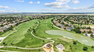 This delightful 2-bedroom home with a study and 2.5 baths is on Wildhorse Golf Club of Robson Ranch in Texas - for sale on GolfHomes.com, golf home, golf lot