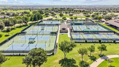 This delightful 2-bedroom home with a study and 2.5 baths is on Wildhorse Golf Club of Robson Ranch in Texas - for sale on GolfHomes.com, golf home, golf lot