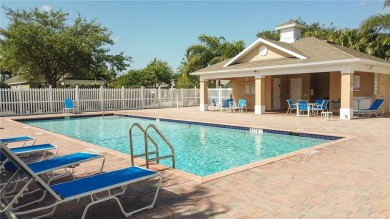 Pointe West townhome is packed with perks--IMPACT WINDOWS for on The Club At Pointe West in Florida - for sale on GolfHomes.com, golf home, golf lot