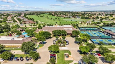 This delightful 2-bedroom home with a study and 2.5 baths is on Wildhorse Golf Club of Robson Ranch in Texas - for sale on GolfHomes.com, golf home, golf lot