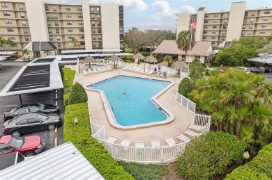 Discover refined living in this beautifully updated 2-bedroom on Cove Cay Country Club in Florida - for sale on GolfHomes.com, golf home, golf lot