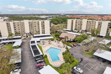 Discover refined living in this beautifully updated 2-bedroom on Cove Cay Country Club in Florida - for sale on GolfHomes.com, golf home, golf lot