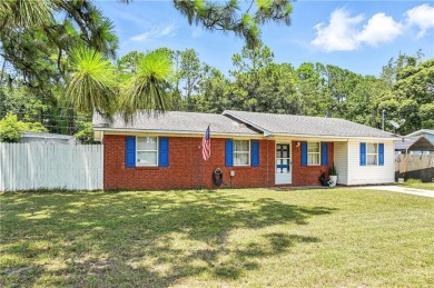 Welcome home to this beautifully maintained 3-bedroom on Brunswick Country Club in Georgia - for sale on GolfHomes.com, golf home, golf lot