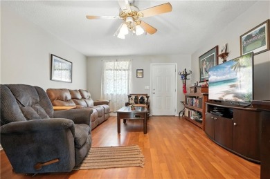Welcome home to this beautifully maintained 3-bedroom on Brunswick Country Club in Georgia - for sale on GolfHomes.com, golf home, golf lot