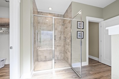 Waiting for a POOL HOME in the Tiger Point Area of Gulf Breeze? on Tiger Point Golf and Country Club in Florida - for sale on GolfHomes.com, golf home, golf lot