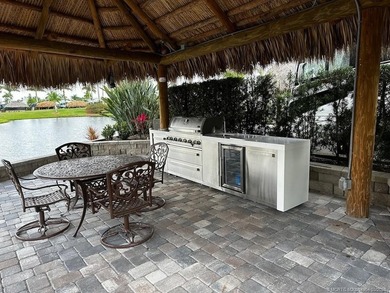 Welcome to this exceptional lakeshore lot boasting expansive on St. Lucie Trail Golf Club in Florida - for sale on GolfHomes.com, golf home, golf lot