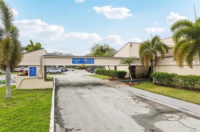 Discover refined living in this beautifully updated 2-bedroom on Cove Cay Country Club in Florida - for sale on GolfHomes.com, golf home, golf lot