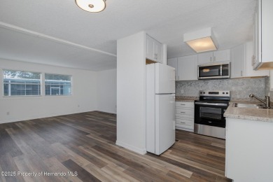 Welcome to this beautifully remodeled home, offering two on High Point Golf Club, Inc. in Florida - for sale on GolfHomes.com, golf home, golf lot