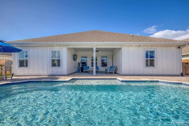 Waiting for a POOL HOME in the Tiger Point Area of Gulf Breeze? on Tiger Point Golf and Country Club in Florida - for sale on GolfHomes.com, golf home, golf lot