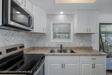 Welcome to this beautifully remodeled home, offering two on High Point Golf Club, Inc. in Florida - for sale on GolfHomes.com, golf home, golf lot