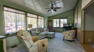 Located on a corner lot with ample room for guest parking, this on The Great Outdoors Golf and Country Club in Florida - for sale on GolfHomes.com, golf home, golf lot