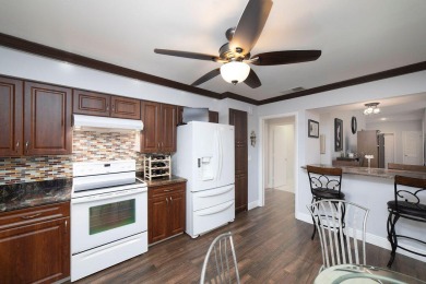 This beautiful 2/2/2 sitting on the 5th hole of the Golf Course on Martin Downs Country Club in Florida - for sale on GolfHomes.com, golf home, golf lot