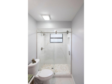 This beautiful 2/2/2 sitting on the 5th hole of the Golf Course on Martin Downs Country Club in Florida - for sale on GolfHomes.com, golf home, golf lot