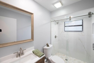 This beautiful 2/2/2 sitting on the 5th hole of the Golf Course on Martin Downs Country Club in Florida - for sale on GolfHomes.com, golf home, golf lot