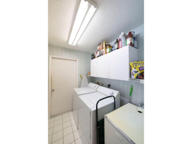 This beautiful 2/2/2 sitting on the 5th hole of the Golf Course on Martin Downs Country Club in Florida - for sale on GolfHomes.com, golf home, golf lot