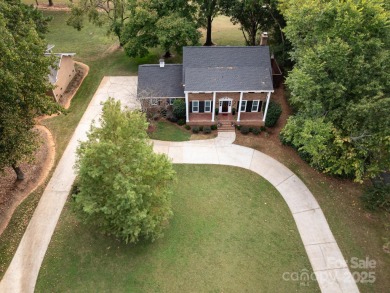 Welcome to your retreat on Pine Lake Country Club's No.7 green & on Pine Lake Country Club in North Carolina - for sale on GolfHomes.com, golf home, golf lot