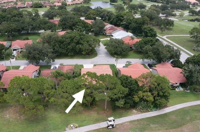 This beautiful 2/2/2 sitting on the 5th hole of the Golf Course on Martin Downs Country Club in Florida - for sale on GolfHomes.com, golf home, golf lot