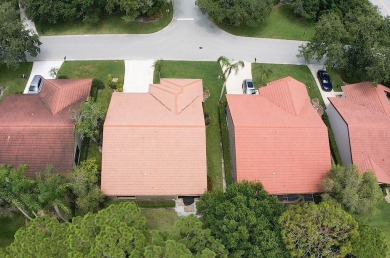 This beautiful 2/2/2 sitting on the 5th hole of the Golf Course on Martin Downs Country Club in Florida - for sale on GolfHomes.com, golf home, golf lot