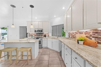 This gorgeous custom-built atrium ranch masterpiece backs to the on Bear Creek Golf Club in Missouri - for sale on GolfHomes.com, golf home, golf lot