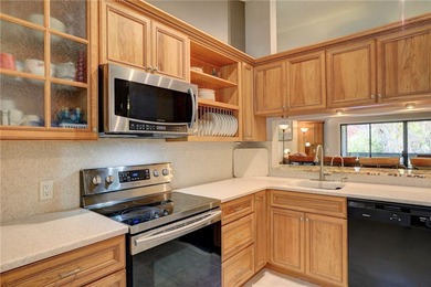 Beautifully furnished condo in gated community East of US 1 on Pelican Pointe 9 Hole Course in Florida - for sale on GolfHomes.com, golf home, golf lot