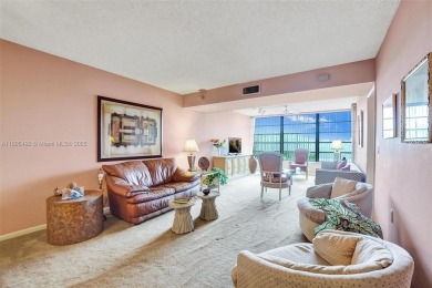 This 2 bedroom 2 bathroom 4th floor Whitehall Condo overlooking on Pine Island Ridge Country Club in Florida - for sale on GolfHomes.com, golf home, golf lot