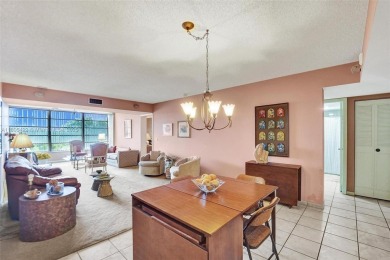 This 2 bedroom 2 bathroom 4th floor Whitehall Condo overlooking on Pine Island Ridge Country Club in Florida - for sale on GolfHomes.com, golf home, golf lot